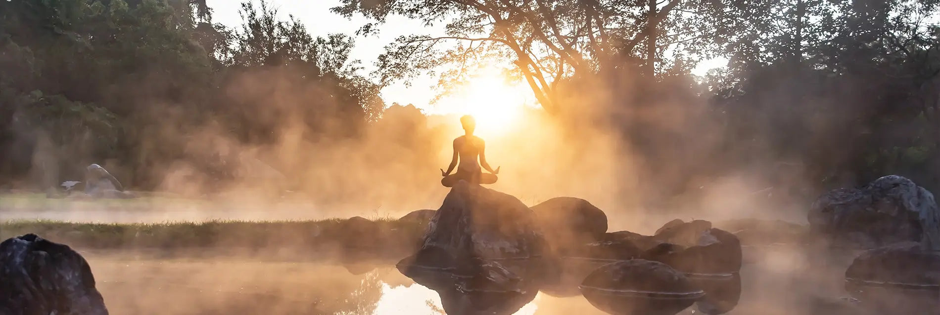 Young woman in silhouette practice yoga in a hot spring