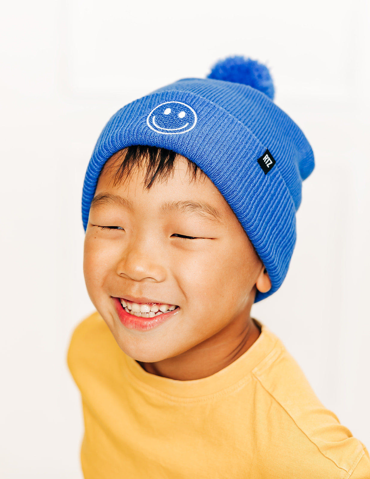 Smiley Pom Pom Beanie Hat