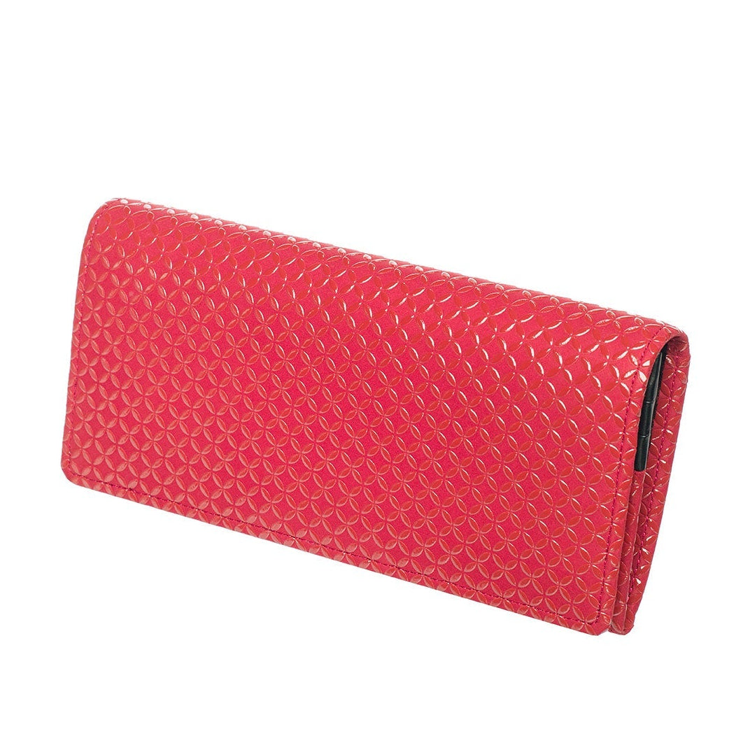 Red textured clutch bag on a white background
