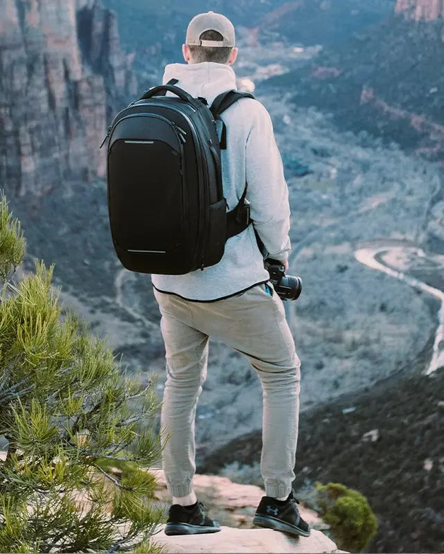 Nomatic Navigator Travel Backpack 32L Being Carried by a Man