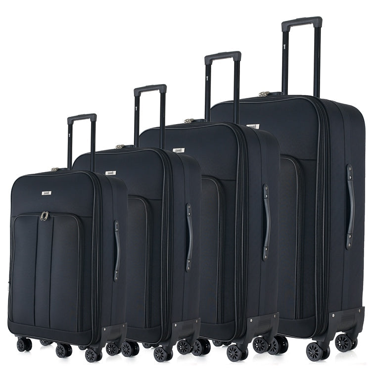 Set of four black suitcases of different sizes on a white background