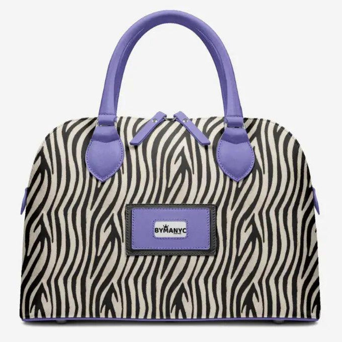 Handbag with zebra pattern and purple handles on a white background