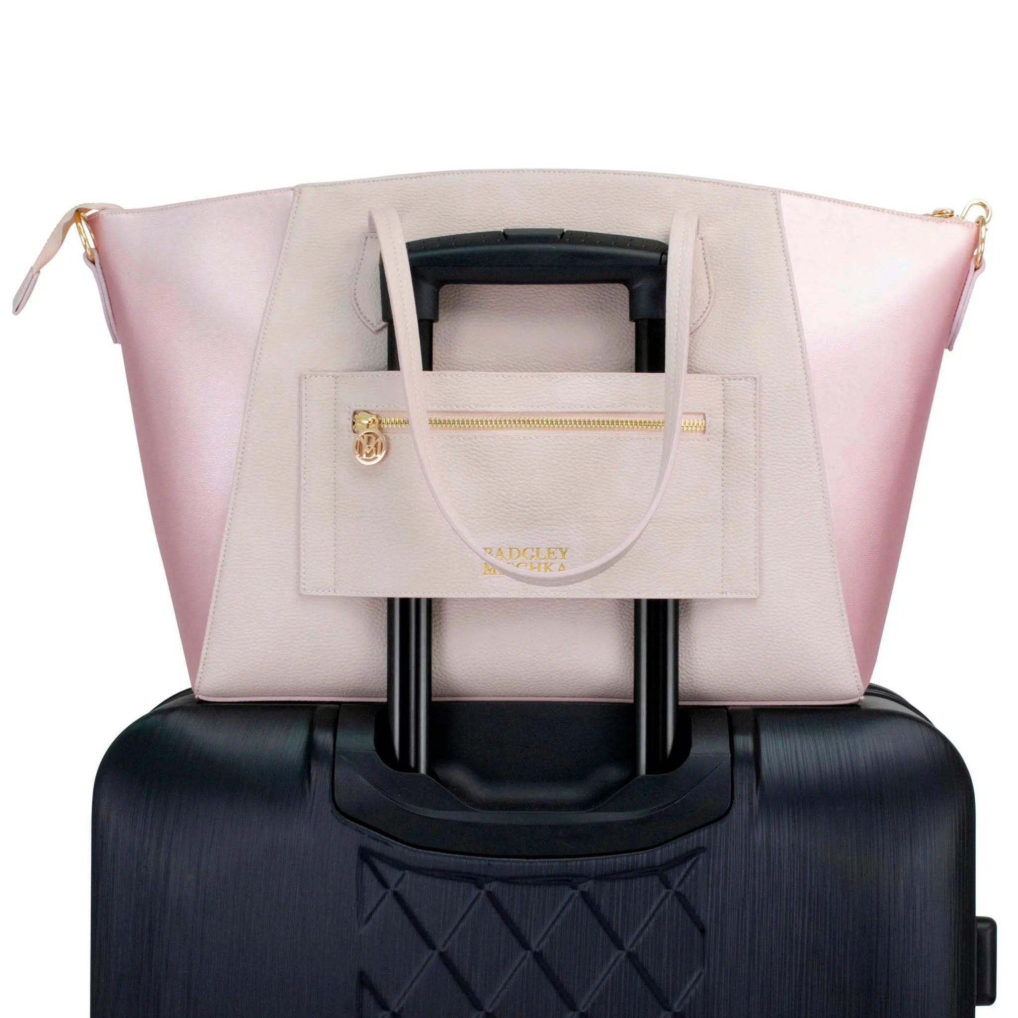 pink vegan leather purse with trolley strap for luggage badgley mischka