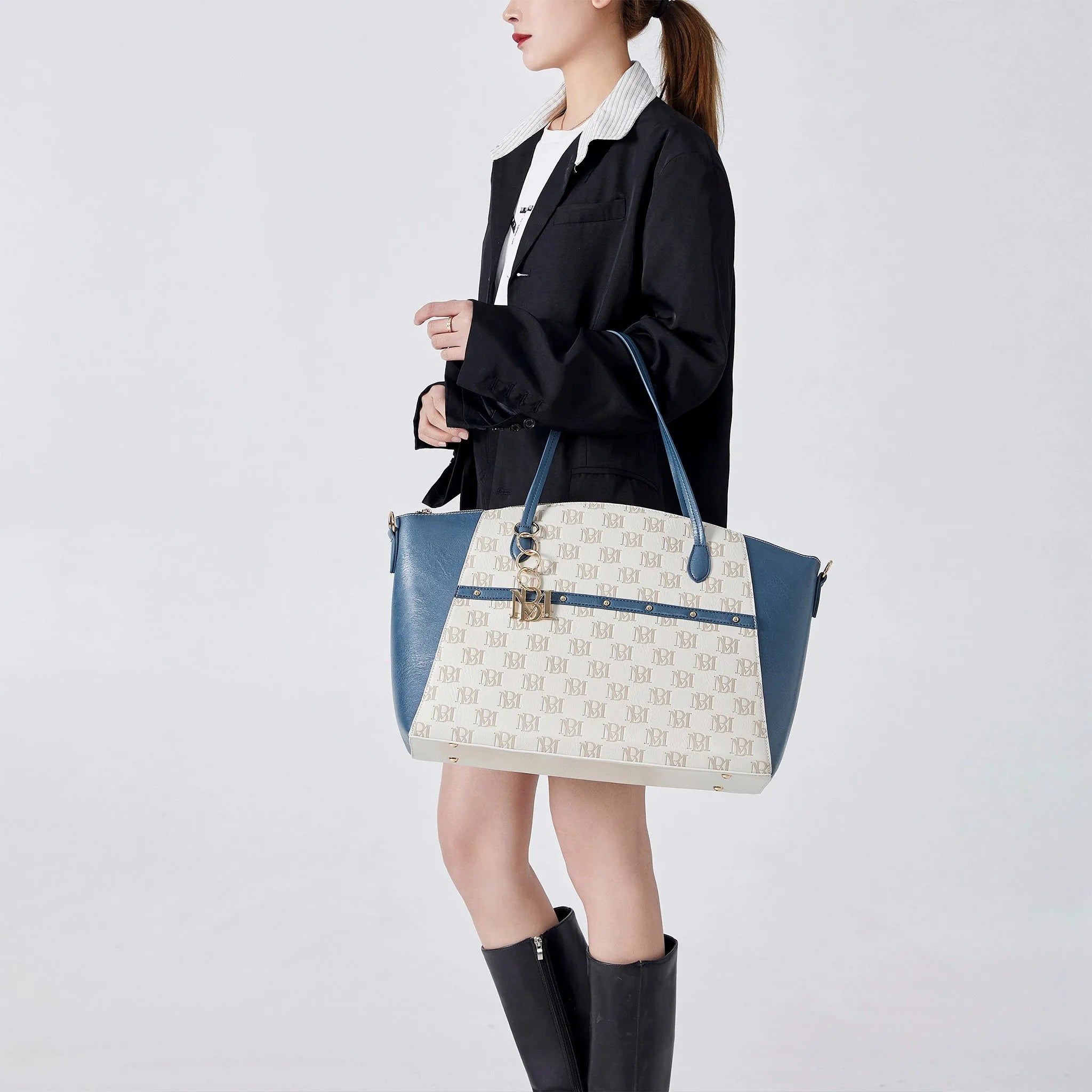 woman with vegan leather fashion purse made by badgley mischka