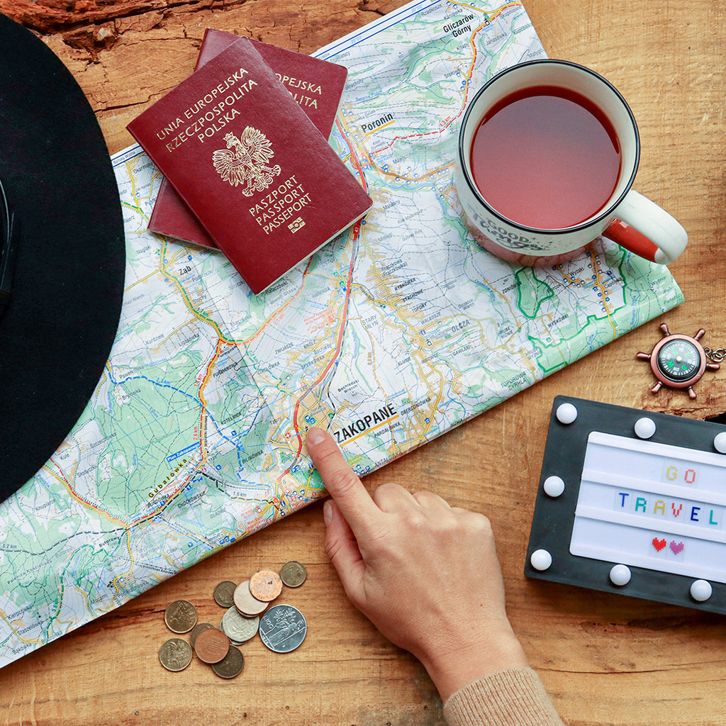 Travel planning with map and passport