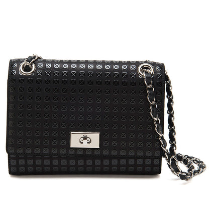 Black textured handbag with chain strap on a white background