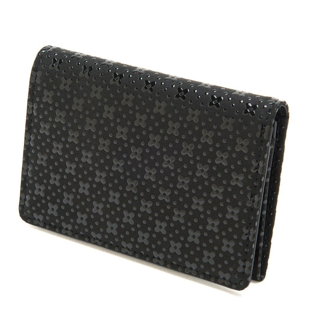 Black textured clutch bag on a white background