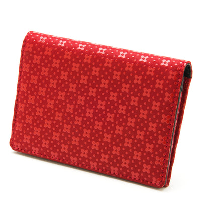 Red textured wallet on a white background