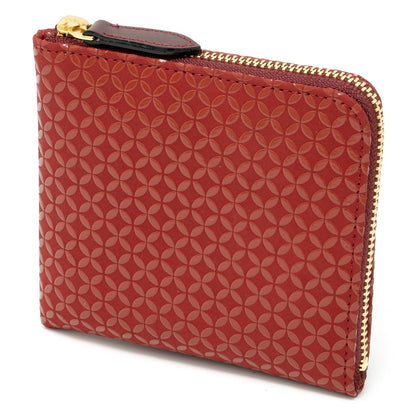 Red patterned zippered pouch on a white background