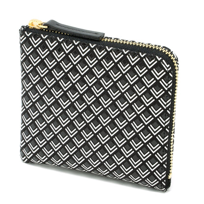 Black and white patterned pouch with gold zipper on a white background