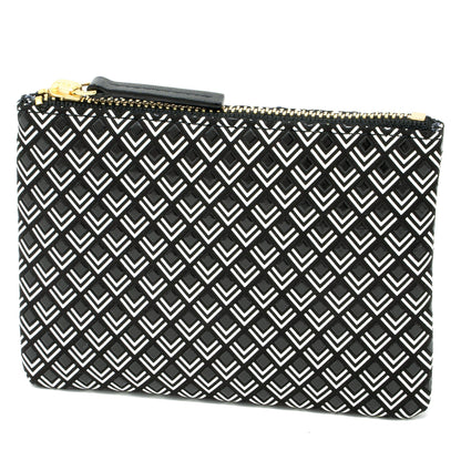 Black and white patterned pouch with a gold zipper on a white background