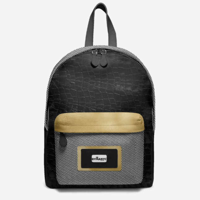 Black backpack with a gold patch on a white background