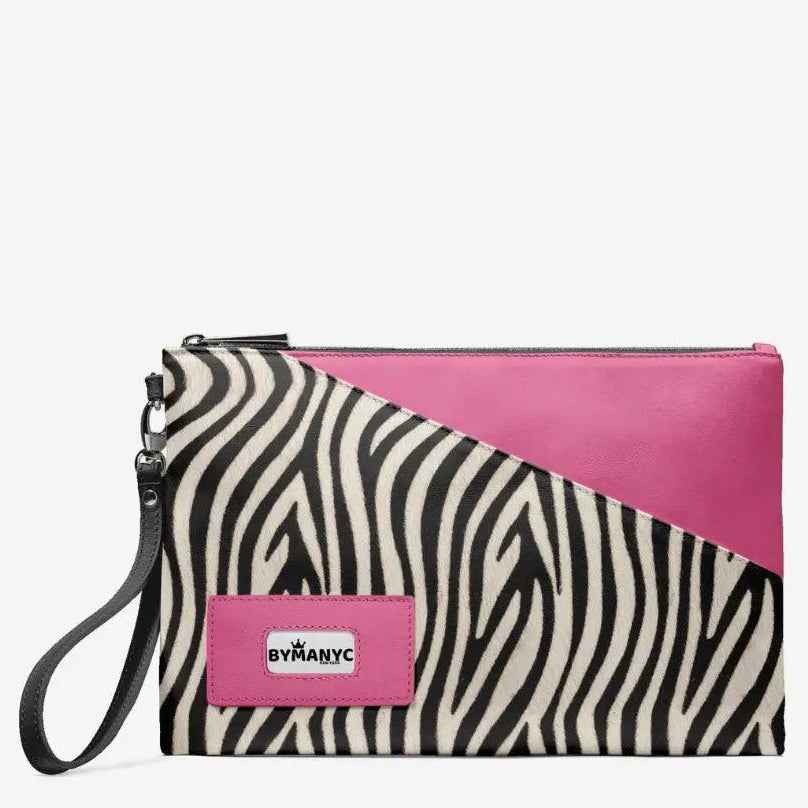 Clutch bag with zebra pattern and pink accents on a white background