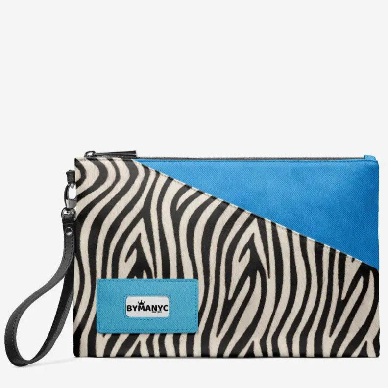 Zebra print clutch with blue accent and Byman NYC label on a white background