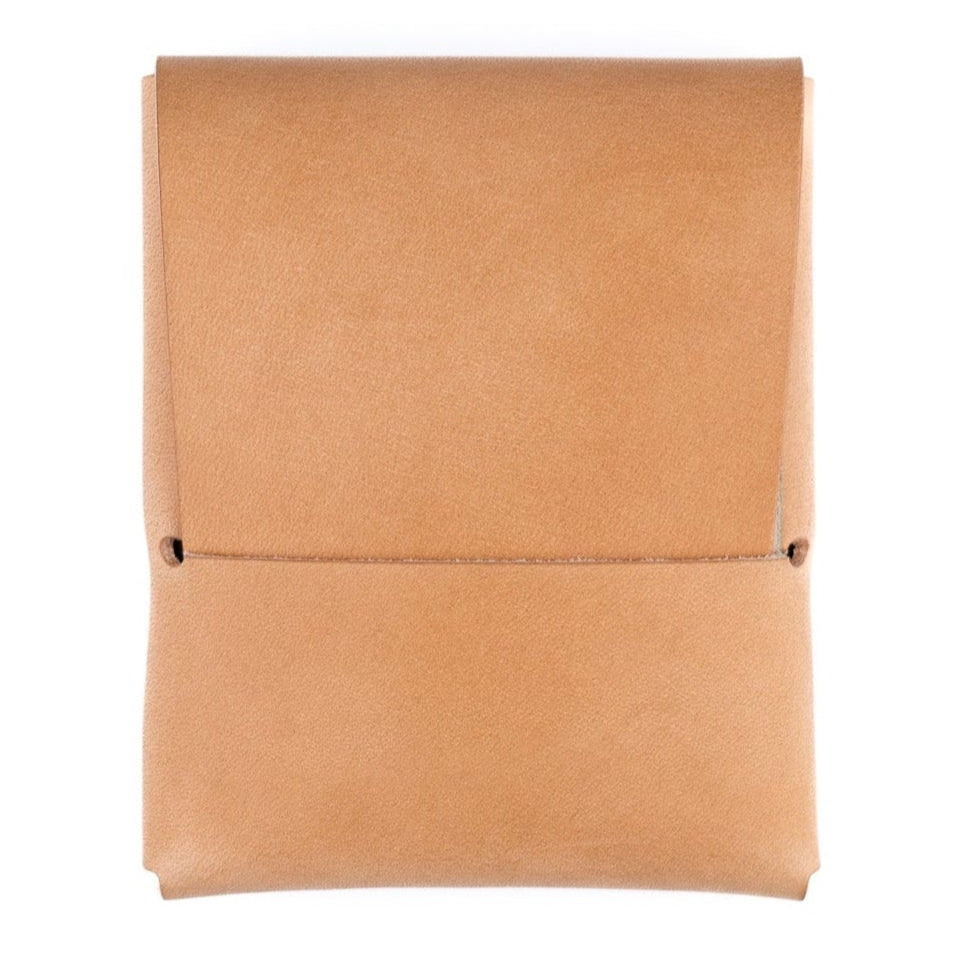 Tan leather wallet on a white background