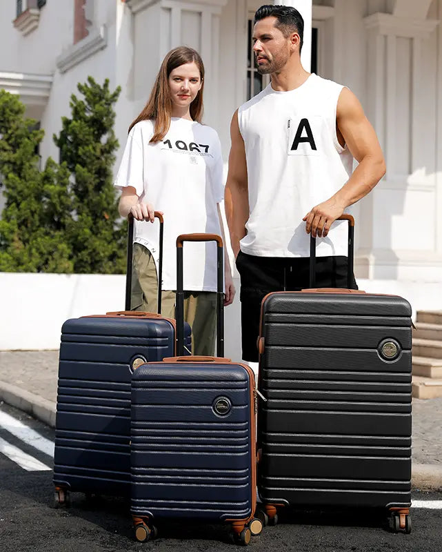 Miami CarryOn Brickell 3 Piece Expandable Retro Spinner Luggage Set Held by Models