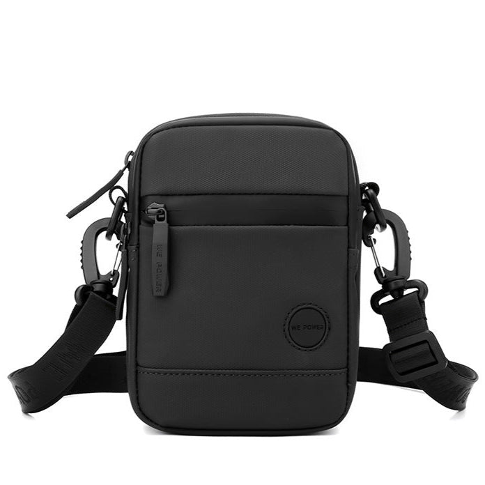 Black crossbody bag with adjustable strap on a white background