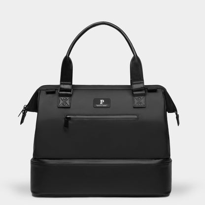 Black handbag with a brand logo on a light gray background
