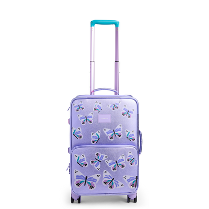 Purple suitcase with butterfly design on a white background