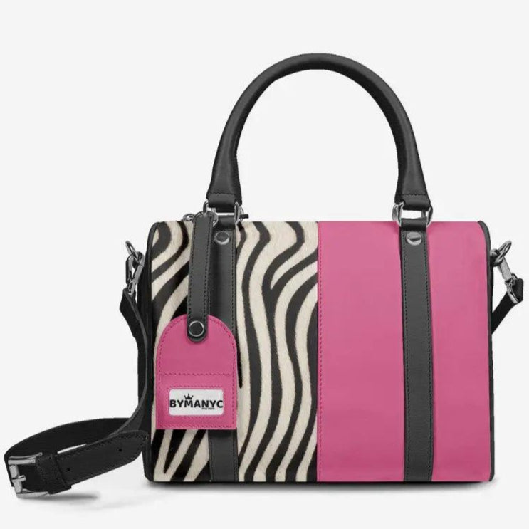 Handbag with zebra pattern and pink accents on a white background