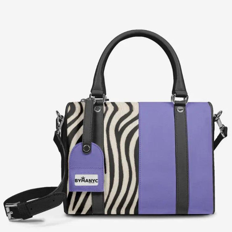 Handbag with zebra pattern and purple accents on a white background