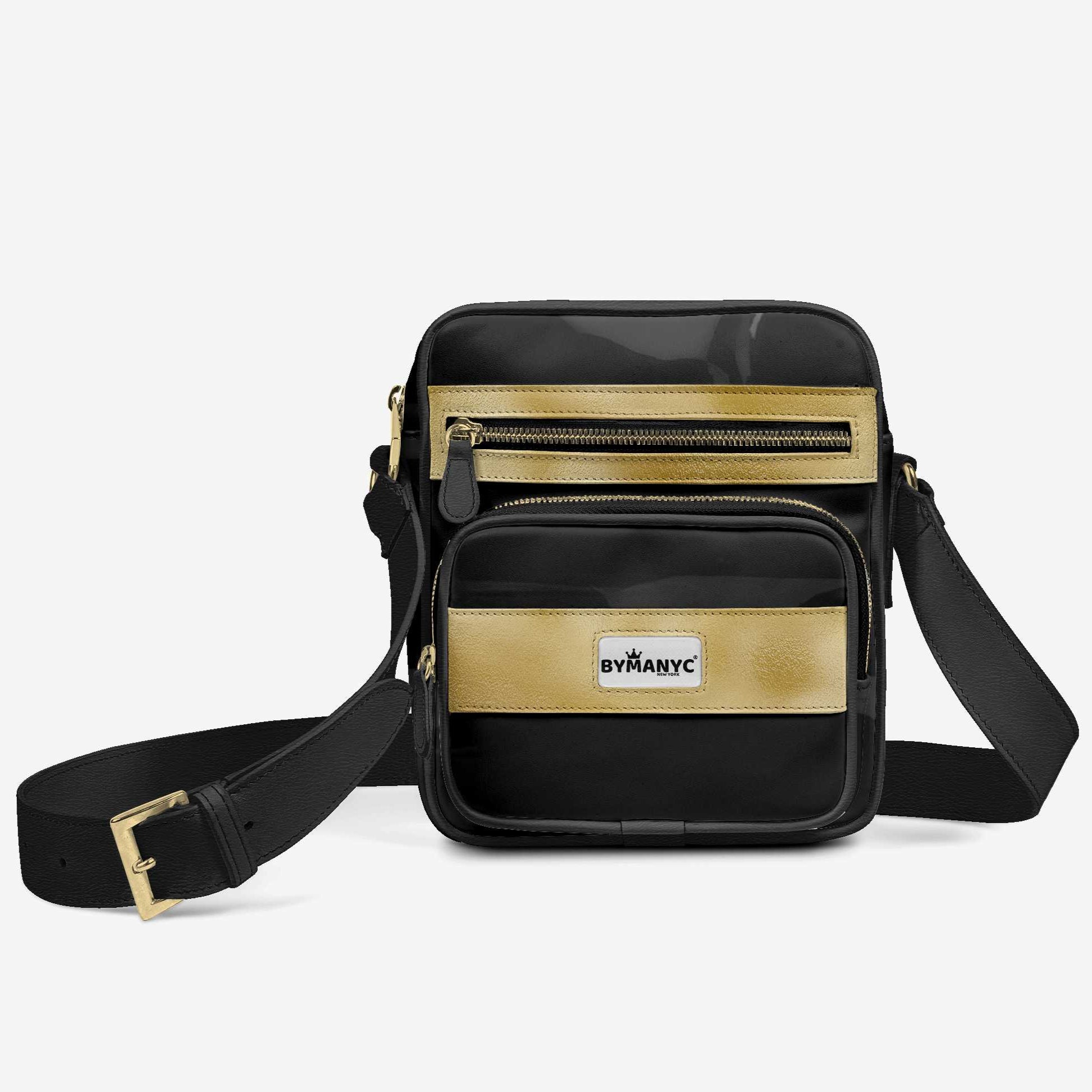 Black crossbody bag with gold accents and logo on a white background