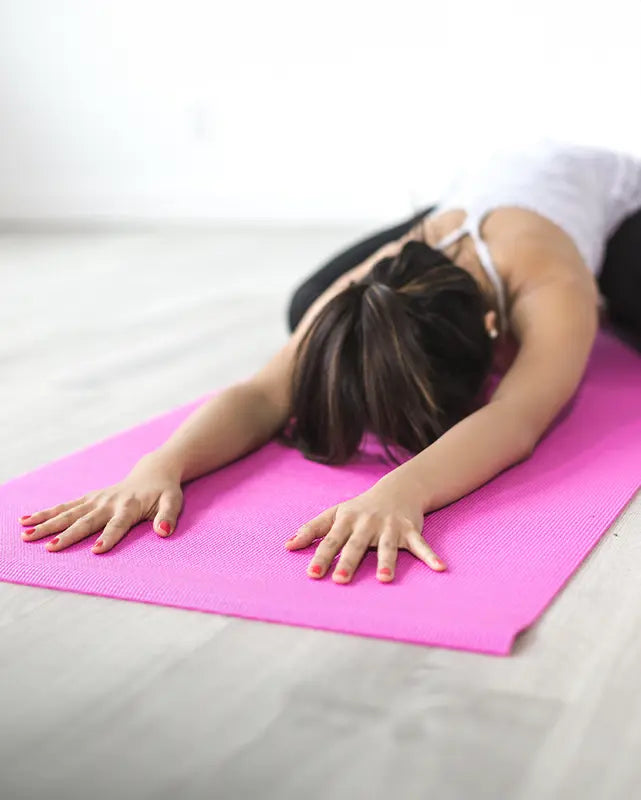 Yoga Mat in Use by Woman