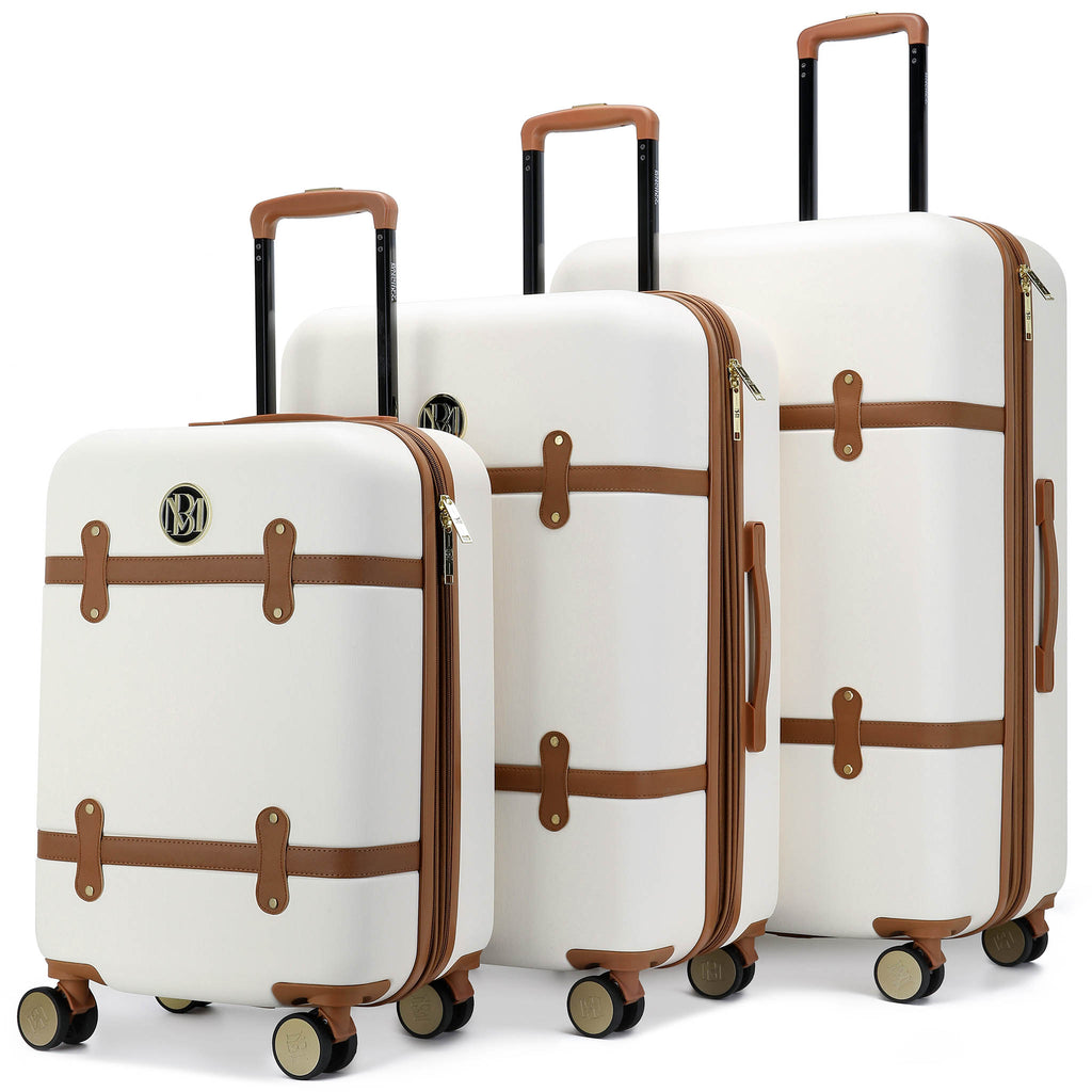 retro white luggage set with brown accents by badgley mischka