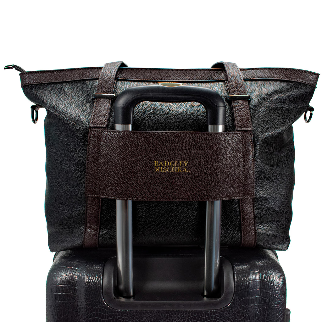 Travel tote bag with luggage attachment
