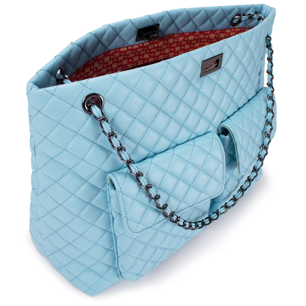 blue quilted pattern bag by badgley mischka