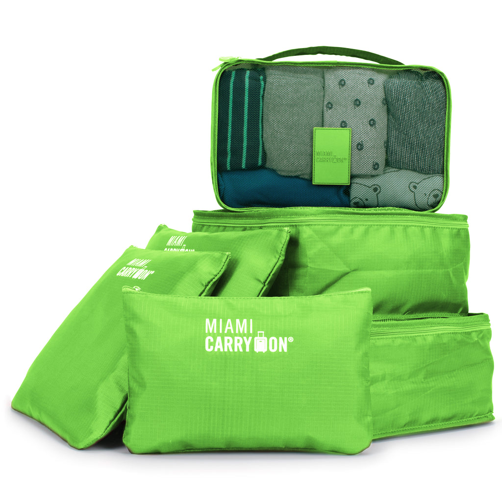 green packing cubes for clothes and traveling