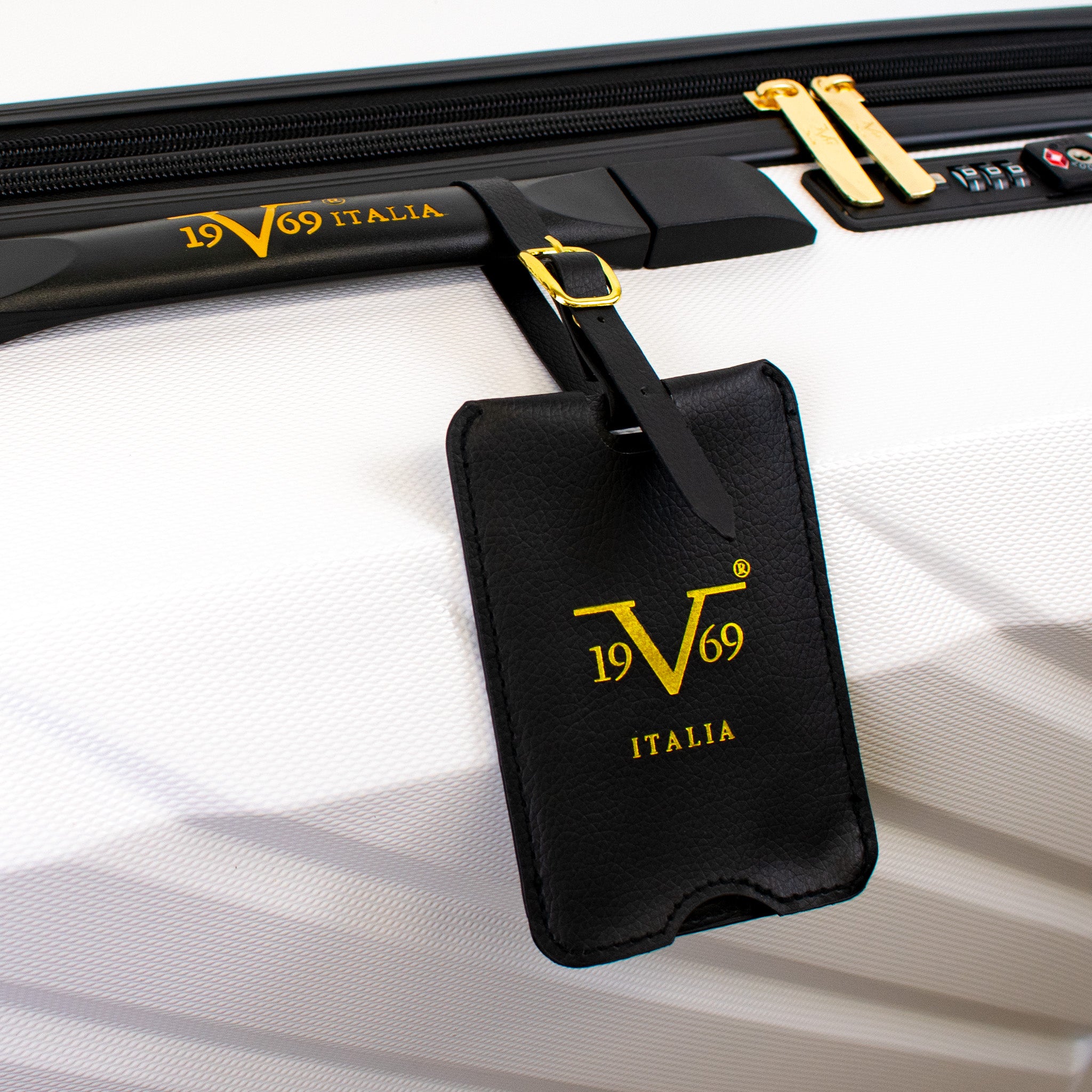 19V69 Italia black vegan leather luggage tag on luggage 