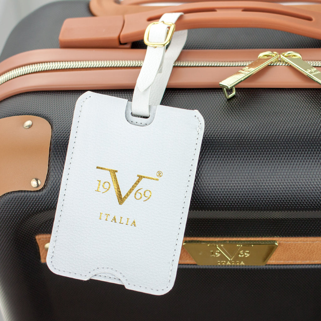 19V69 Italia white vegan leather luggage tag on luggage